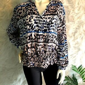 J.Lo Oversized Rayon ruffle bottom top